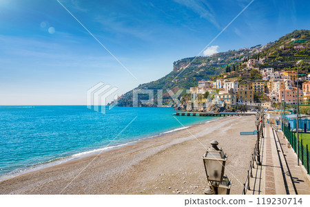 Blue sea and beach in Minori, Amalfi Coast, Campania, Italy. 119230714