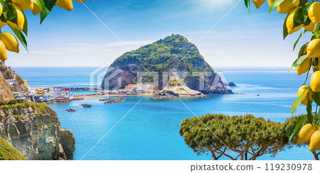 Sant'Angelo village, giant green rock in blue sea near Ischia Island, Italy 119230978