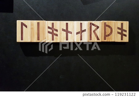 Leonardo written in runic characters engraved on wooden tablets. Leonardo written in runic characters engraved on wooden tablets. 119231122