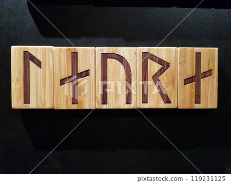 Laura written in runic characters engraved on wooden tablets. Laura written in runic characters engraved on wooden tablets. 119231125