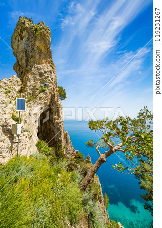 Side view of Arco Naturale, natural arch on coast of Capri island, Italy. 119231267