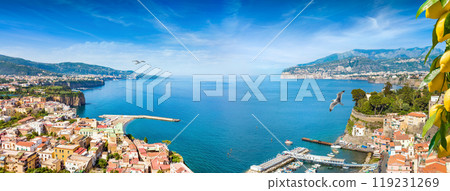 Panoramic collage of cliff coastline Sorrento and Gulf of Naples, Italy. Ripe yellow lemons in foreground. Panoramic collage of cliff coastline Sorrento and Gulf of Naples, Italy. Ripe yellow lemons in foreground. 119231269