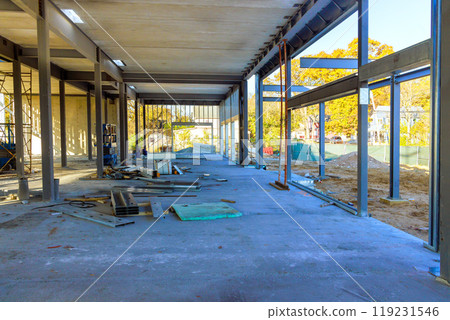 Metal structures of steel beams frame building office during under construction 119231546