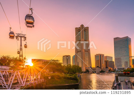 Yokohama cityscape in Japan in October. View of Yokohama Landmark Tower, the sunset, a houseboat, and the Minato Mirai area on the 13th 119231895