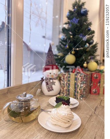 cakes and tea on the windowsill, Christmas decor 119232057