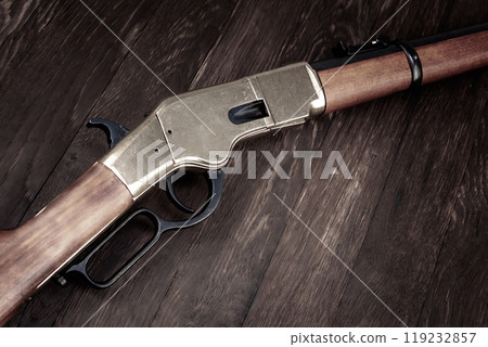 Old west lever action repeating rifle. 119232857
