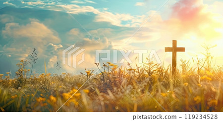 Scenic cross in a lush field, spirituality and nature, with copyspace 119234528
