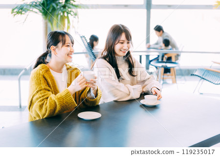 A woman dining at a restaurant 119235017