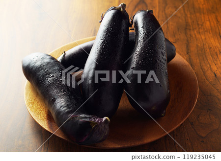 Eggplant served in a wooden dish Eggplant served in a wooden dish 119235045