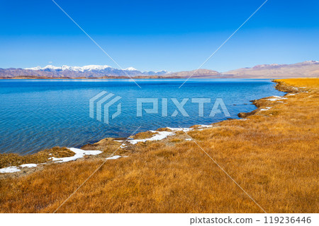 Karakul lake in the Pamir Mountains in Tajikistan 119236446