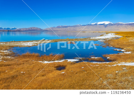 Karakul lake in the Pamir Mountains in Tajikistan Karakul lake in the Pamir Mountains in Tajikistan 119236450