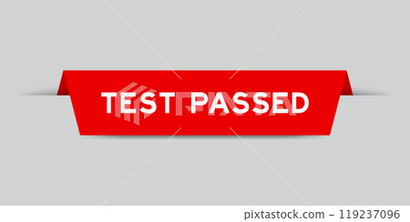 Red color inserted label with word test passed on gray background 119237096