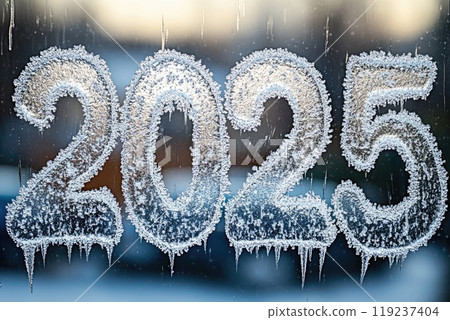 Frost forming the number 2025 on window during sunset 119237404
