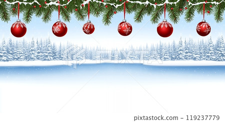 Red ornaments hang from a snowy pine branch over a wintery forest scene. 119237779
