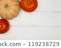 Halloween background with pumpkins. Flat lay. Frame with Halloween figures on white table, top view. Hallowen decorations for greeting and invitation. Happy Helloween concept. Holidays background 119238729