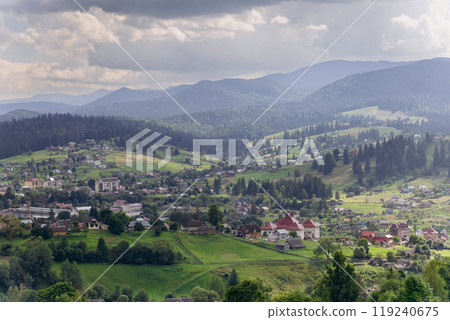 Scenic landscape view of Vorokhta, picturesque mountain village with green hills and forests 119240675