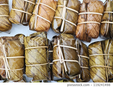 coconut sticky rice and banana wrapped coconut sticky rice and banana wrapped 119241498