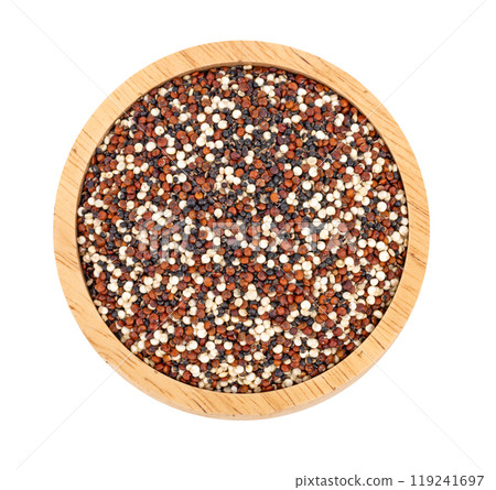 Tri-color quinoa in a wooden bowl, top view Tri-color quinoa in a wooden bowl, top view 119241697