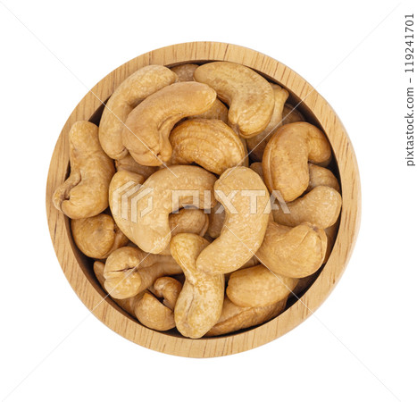 Roasted cashews in wooden bowl ,top view Roasted cashews in wooden bowl ,top view 119241701