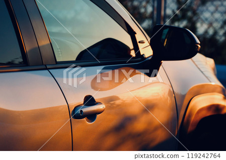 Car in the morning sun Car in the morning sun 119242764