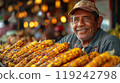 A street vendor selling Mexican street corn 119242798