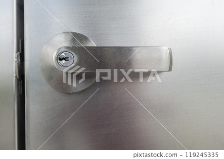 Metal door handle lock with Keyhole. Stable of Stainless steel door handle closed, Space for text, Metal door handle lock with Keyhole. Stable of Stainless steel door handle closed, Space for text, 119245335