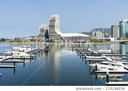 View of Yacht Marina at Glory Pier of Kaohsiung Port, Taiwan. with the Kaohsiung Music Center building. 119246856