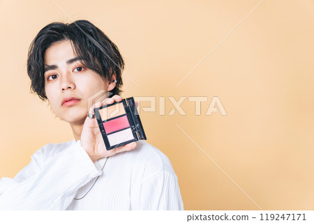 Men with makeup palettes, genderless makeup, men's cosmetics, skin care Men with makeup palettes, genderless makeup, men's cosmetics, skin care 119247171