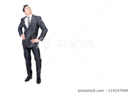 Arrogant man in formal suit. White background. Arrogant man in formal suit. White background. 119247999
