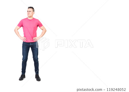 Displeased man looking at camera with suspicion 119248052