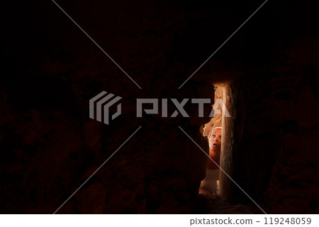 Archaeologist explorer discovering a priceless hidden treasure 119248059