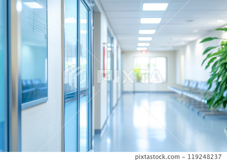A hospital corridor where soft sunlight fills the space 119248237