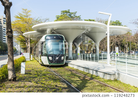 The circular light rail train drives past the Neiwei Arts Center station in Kaohsiung, Taiwan. 119248273