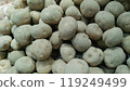 A lot of potatoes lined up at a fruit and vegetable store_1509 119249499
