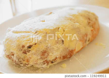 Stollen on a white plate Stollen on a white plate 119249911