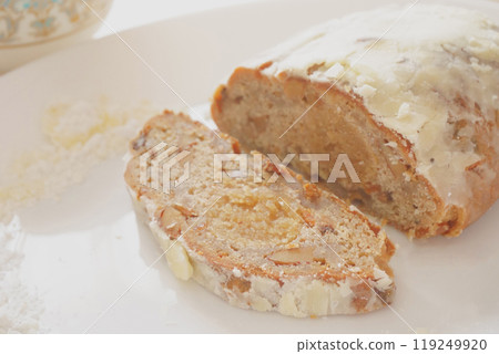 Chopped stollen on a white plate 119249920