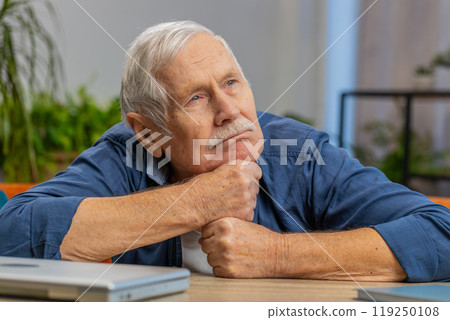 Senior man at home suffers from unfair situation problem break up depression bad sick ill annoyed 119250108