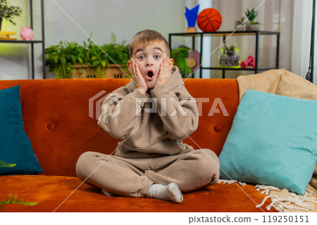 Excited boy child kid surprised, shocked by sudden victory good win news, celebrating, wow reaction Excited boy child kid surprised, shocked by sudden victory good win news, celebrating, wow reaction 119250151