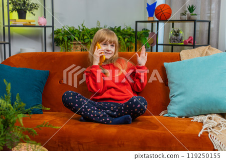 Happy surprised child girl having pleasant conversation phone call good news enjoying talking gossip 119250155