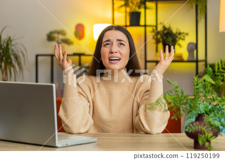 Aggressive woman screams from stress tension problems panic hopelessness fear surprise shock nervous Aggressive woman screams from stress tension problems panic hopelessness fear surprise shock nervous 119250199