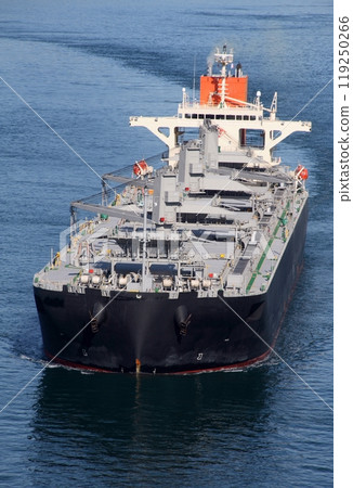 A large cargo ship approaching the Kurushima Kaikyo Bridge 119250266