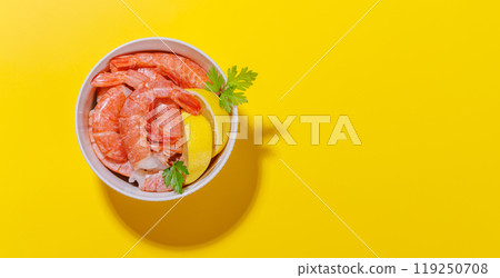 Fresh shrimps, accompanied by sprigs of fresh parsley and juicy lemon 119250708