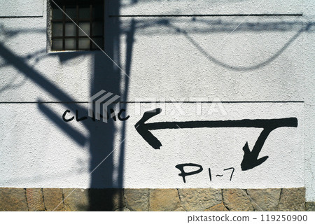 Parking information painted on a storehouse Parking information painted on a storehouse 119250900