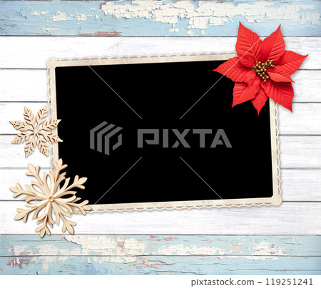 Vintage eco friendly holiday backdrop. Christmas background with  retro photo, poinsettia, snowflake on wooden boards. Copy space for text. Ecology, environmental conservation, zero waste concept 119251241