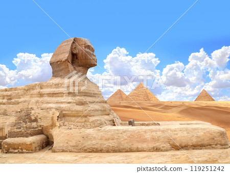 Famous Great Sphinx and pyramids of Chephren, Cheops, Menkaure, Cairo, Egypt. Great Pyramids and statue of Sphinx, mythical creature with head of man and body of lion, Giza complex (Giza Necropolis) Famous Great Sphinx and pyramids of Chephren, Cheops, Menkaure, Cairo, Egypt. Great Pyramids and statue of Sphinx, mythical creature with head of man and body of lion, Giza complex (Giza Necropolis) 119251242