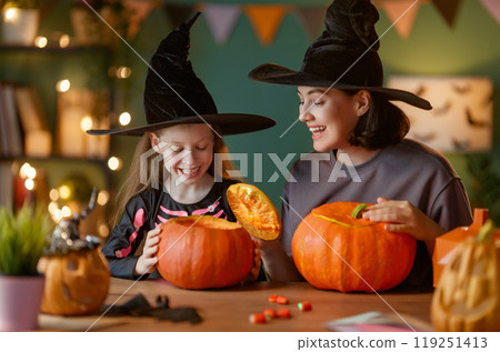 Happy family preparing for Halloween. 119251413