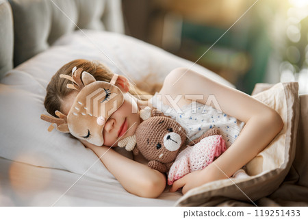 child is sleeping in the bed child is sleeping in the bed 119251433