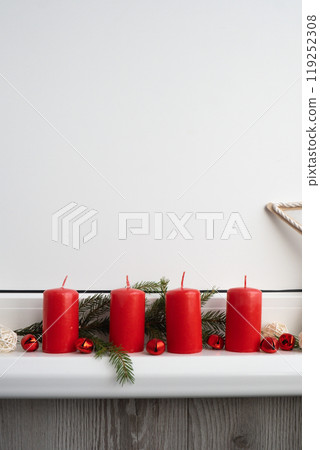 Four Advent red candles, fir branches and Christmas zero waste decorations in windowsill. Holiday preparation copy space for text. Catholic traditions of Christmas new year winter Four Advent red candles, fir branches and Christmas zero waste decorations in windowsill. Holiday preparation copy space for text. Catholic traditions of Christmas new year winter 119252308