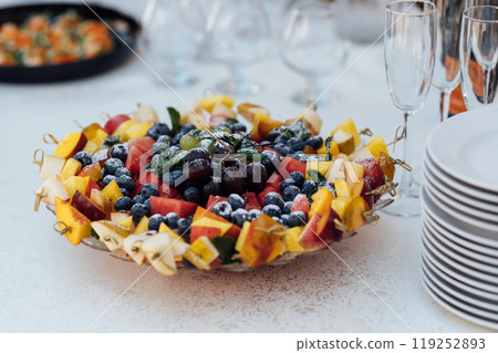 Wedding party. Buffet table with vegetables and fruits. Wedding party. Buffet table with vegetables and fruits. 119252893