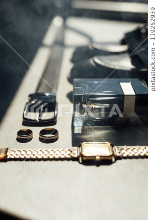 Groom's accessories for a wedding. Smoke adds authenticity to a photo 119252939
